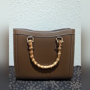 Brown Leather tote bag with bamboo handles and extra strap
